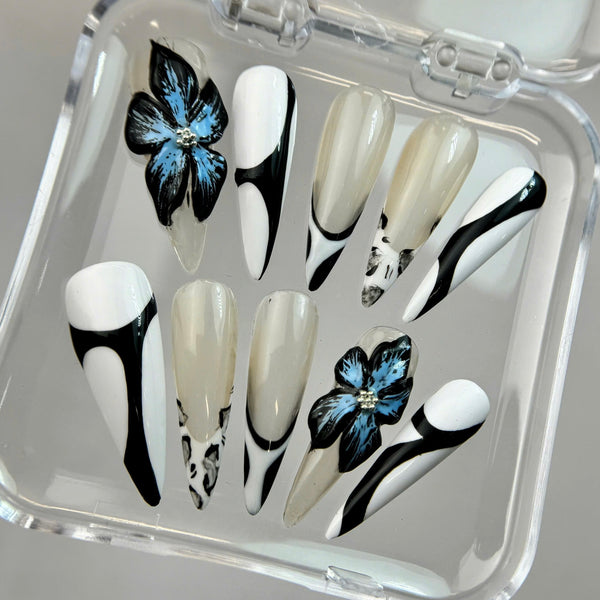 BLUE FLOWERS IN DARKNESS